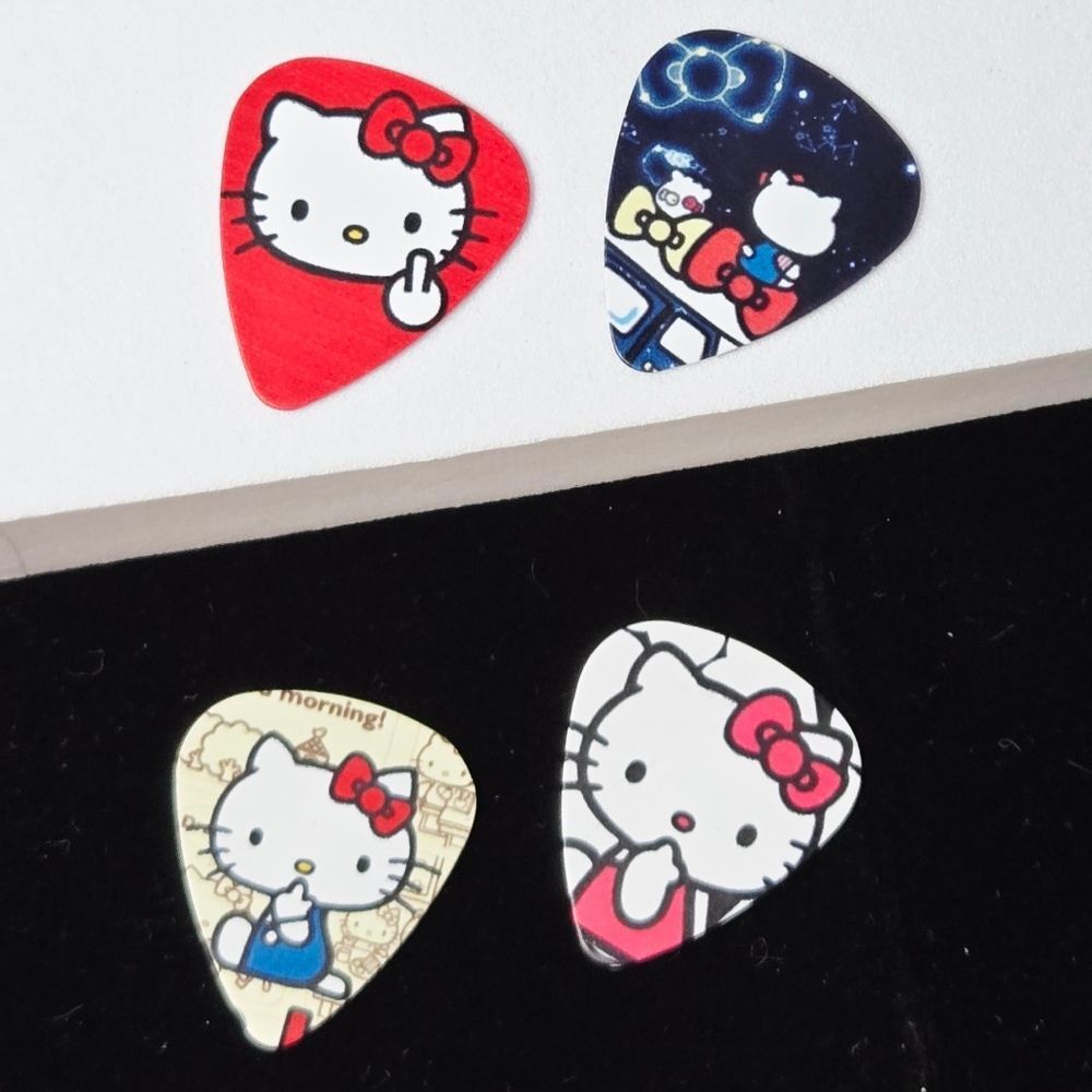 Hello Kitty Guitar Picks Set 4pcs .71mm Edgy Kawaii Plectrum Pack Cheeky Sassy